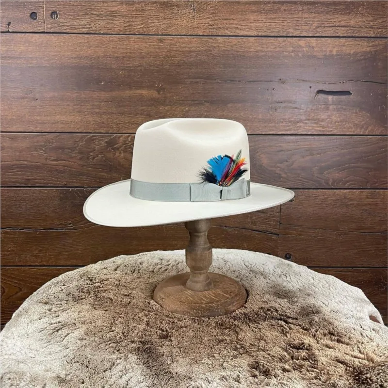 A beige felt wide-brimmed top hat with colorful feathers and hood