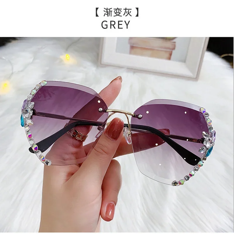 

2024 new mesh red diamond sunglasses women frameless cut edge sunglasses shading street snap INS trend