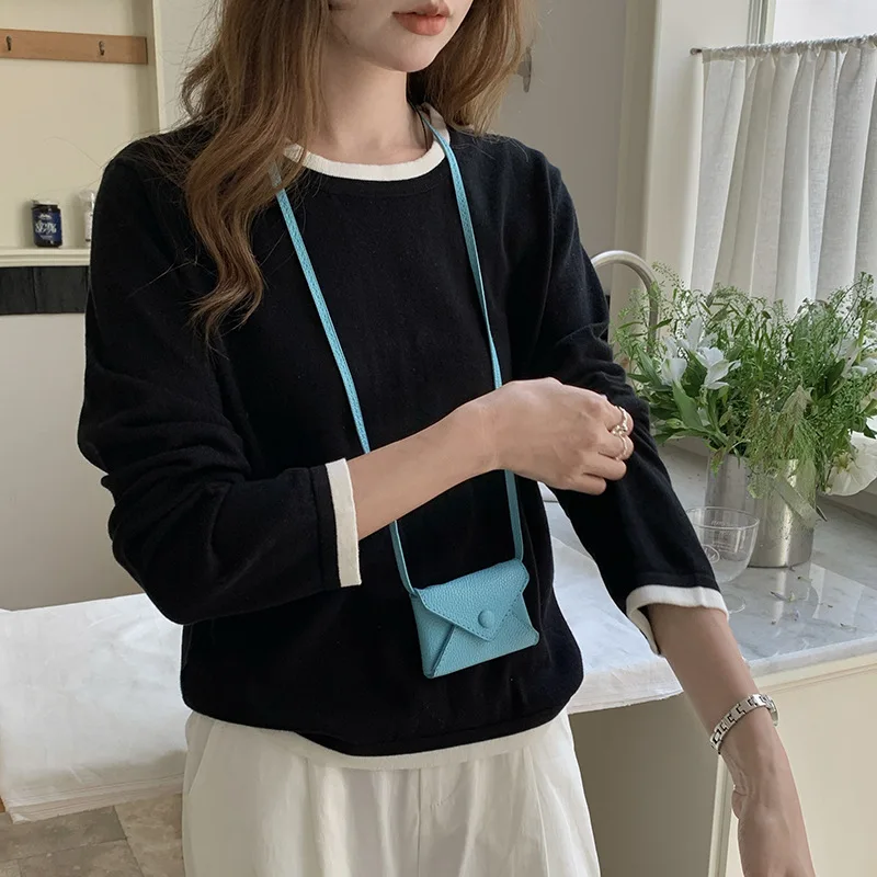Chic Fake Two Pieces Color Blocked Women's T-Shirt Loose Simple Round Neck Long Sleeve Tops 2026 Spring New Style Versatile Tees