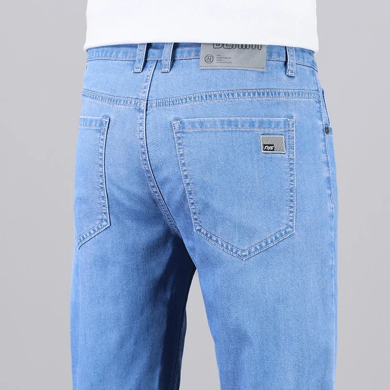 

Spring Summer New Men's Slim Jeans Thin Stretch Fashion Business Straight Trousers Casual Lyocell Fabric Soft Denim Trousers