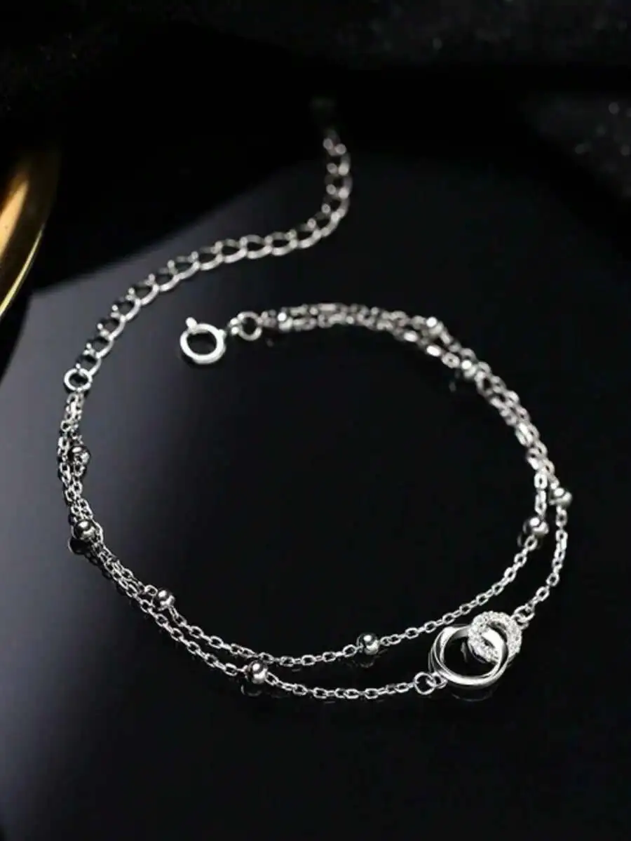 

Elegant Double Chain Mobius Design Bracelet With Sparkling Crystal Detail For Women, Luxury Gift Accessory