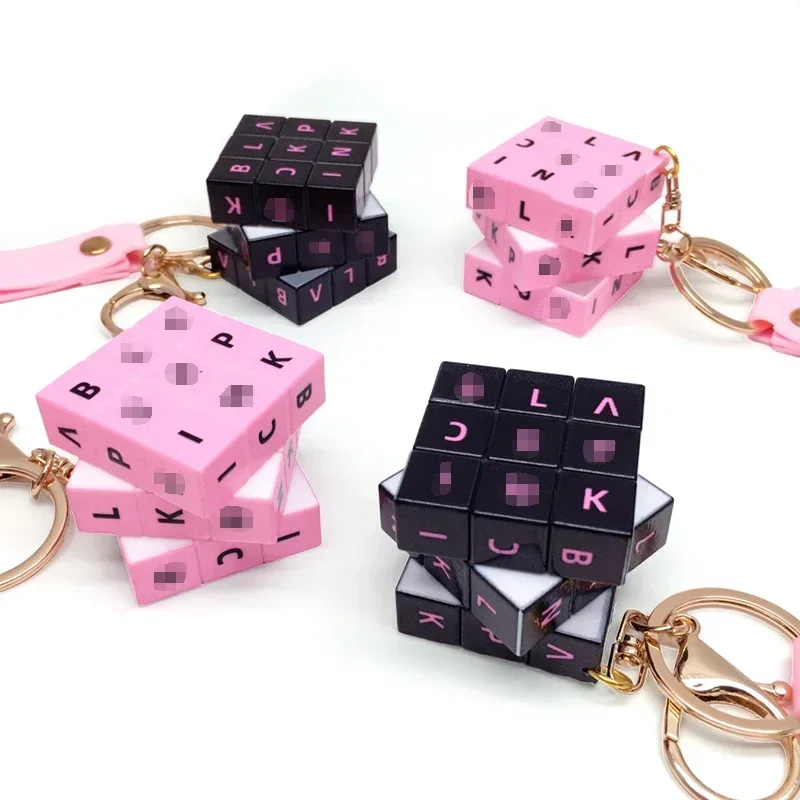 Cute black and pink Mini Rubik's Cube Keychain Pendant Wholesale Cartoon Book Bag Pendant Small Jewelry Keychain