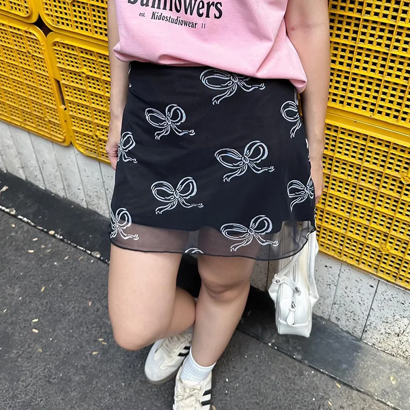 Europe and the United States sexy spice girl bow print gauze skirt women low waist slim bottom skirt cover buttock