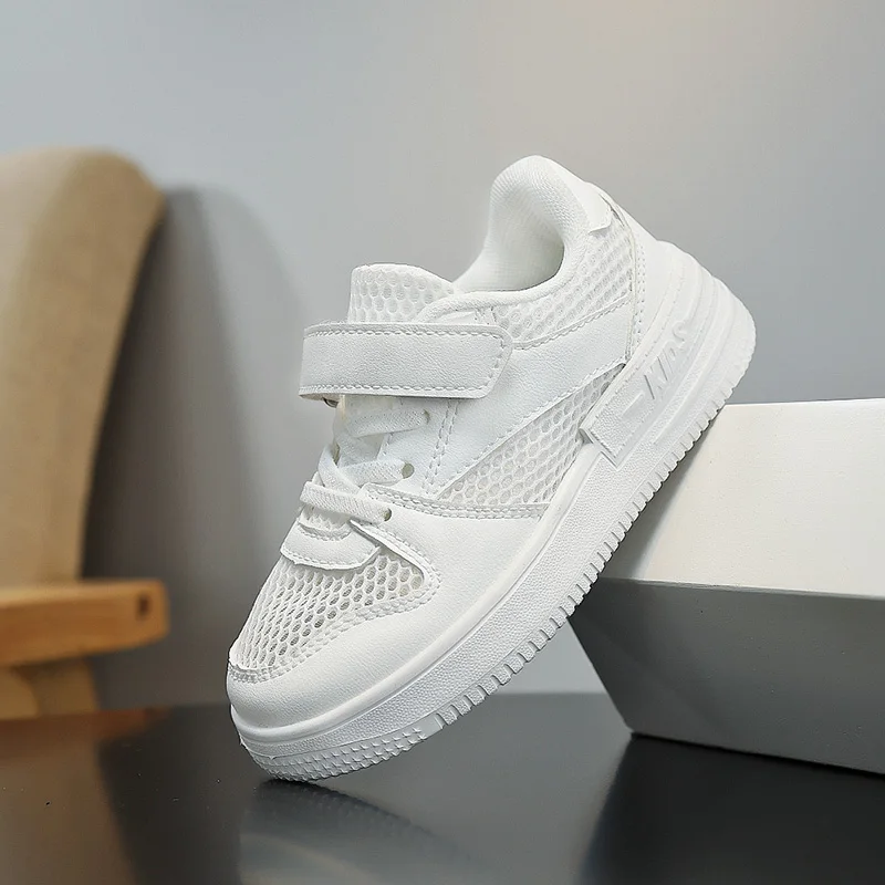 

A pair of children's sports shoes with mesh design, durable sole, and convenient Velcro fastening for a casual styleYY-2402