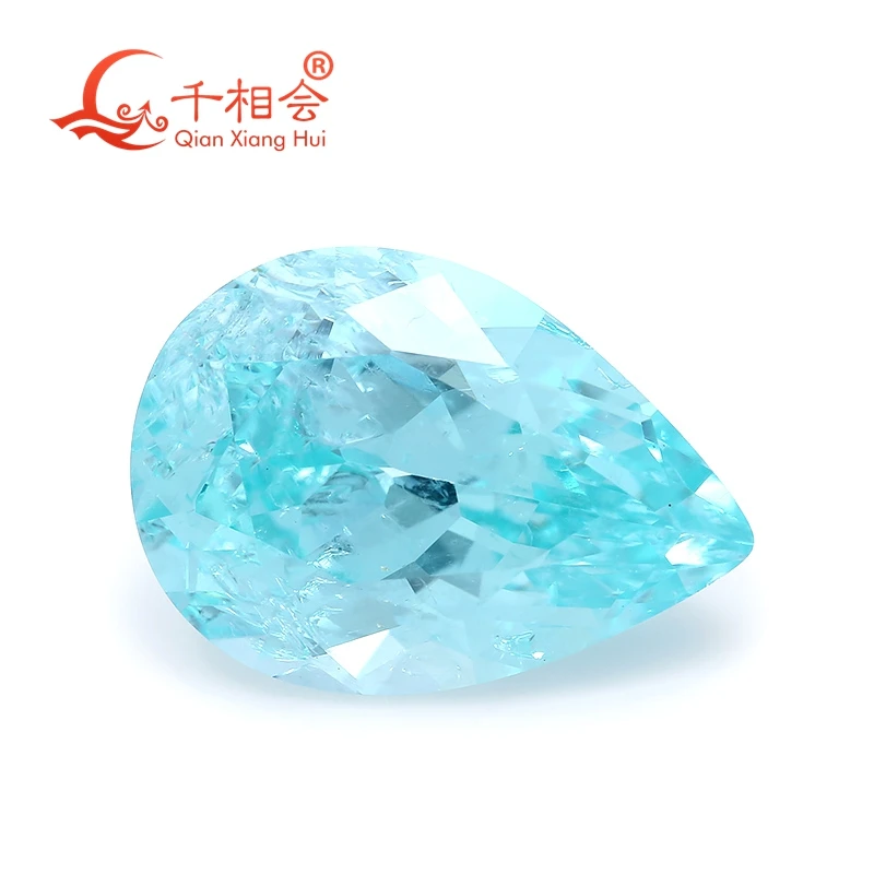 

Pear shape blue color Paraiba with a neon glow lab grown Yttrium Aluminum Garnet with inclusions Neon-like gem stone jewelry YAG