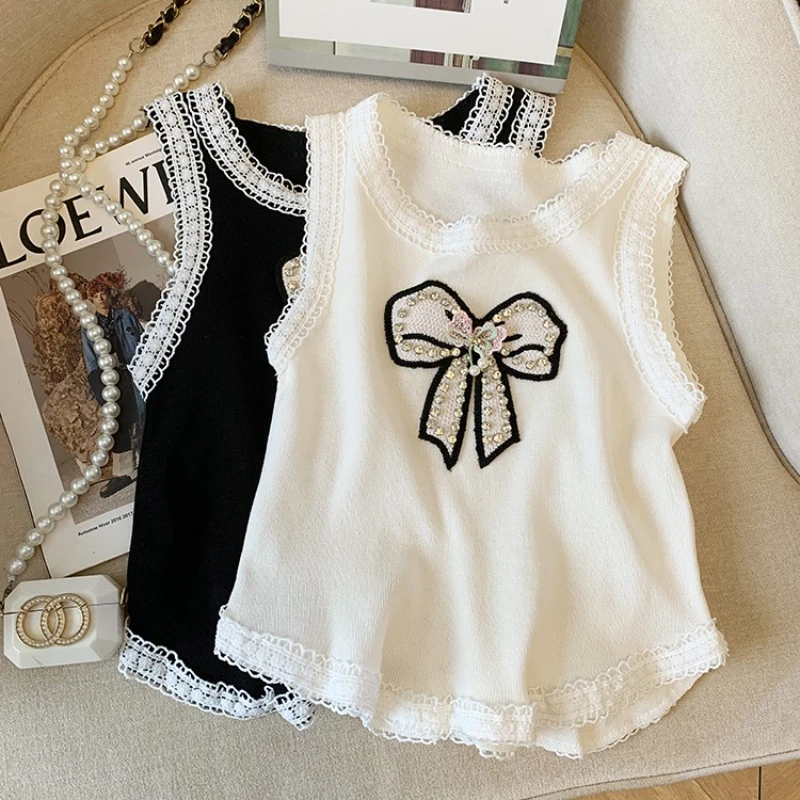 

2025 New Summer Women Fashion O-neck Sleeveless Camisole Rhinestone Bow Decoration Lace Lace Elastic Tank Tops Sweater Vest