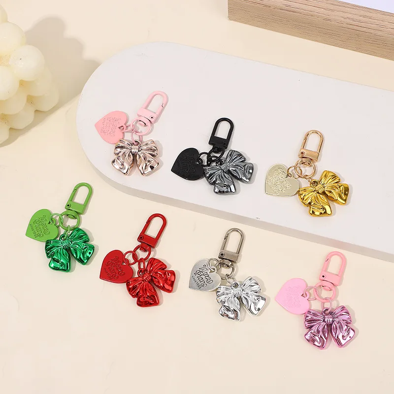 Creative personalized color-plated bow keychain pendant, girls bag, mobile phone case pendant, exquisite small gift accessories.