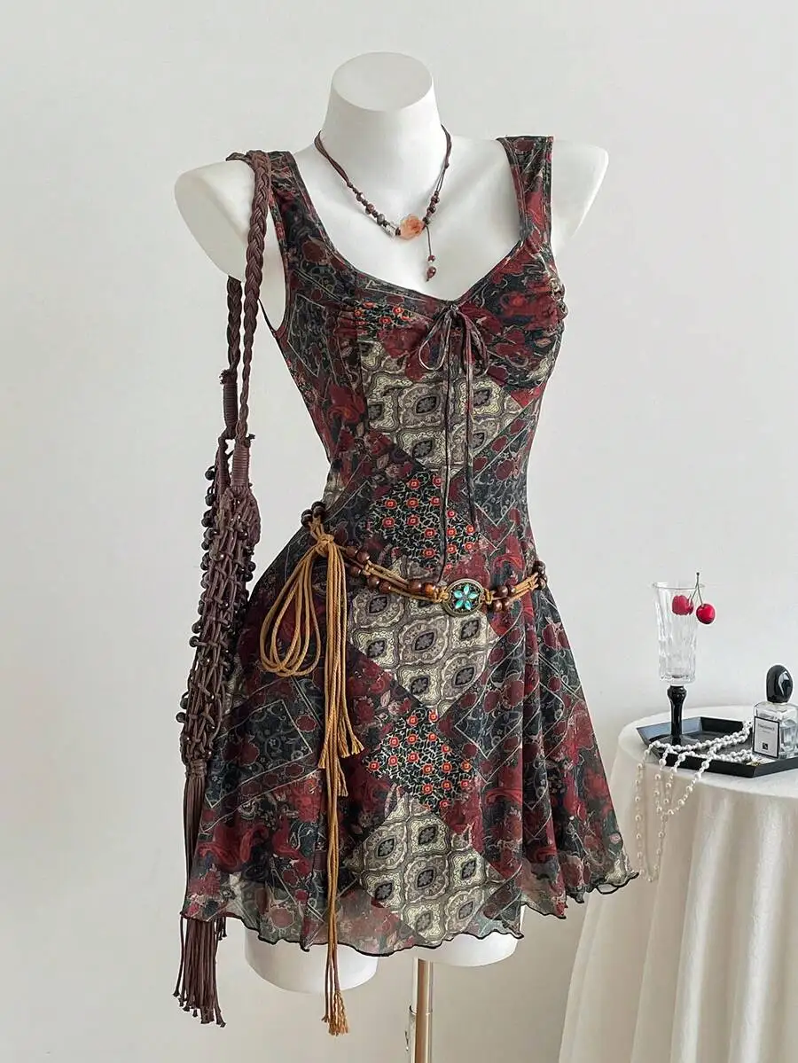 

Vintage Floral Sleeveless Mini Dress With Ruffle Hem And Waist Cinch Bohemian Beach Style