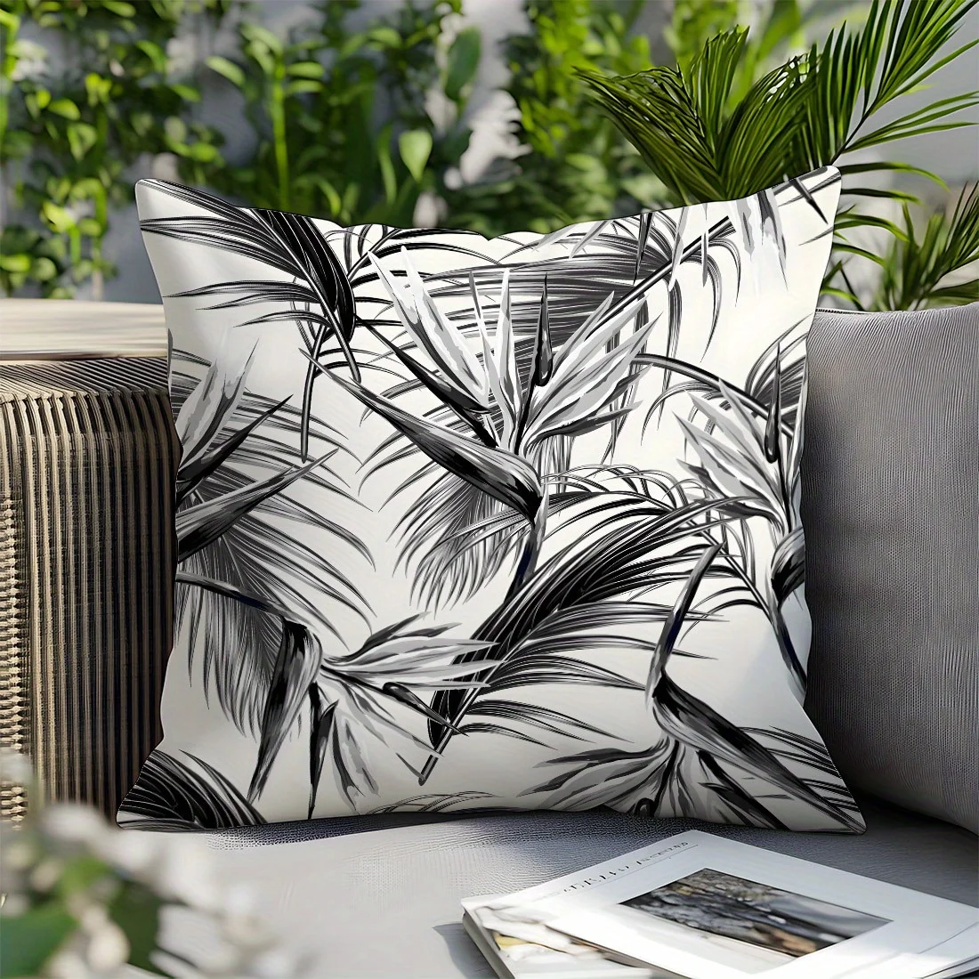 Black and white leaf print throw pillowcase, machine washable polyester material, suitable for living room and bedroom decor.