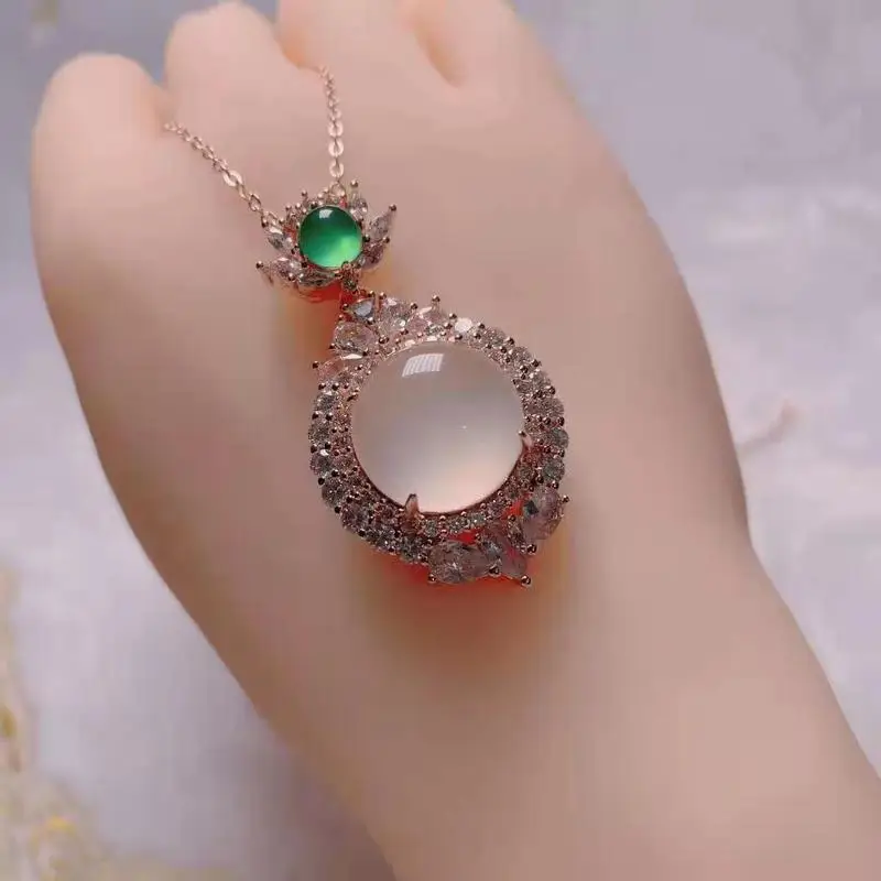 High-transparency green chalcedony large cabochon pendant, luxuriously set with diamonds