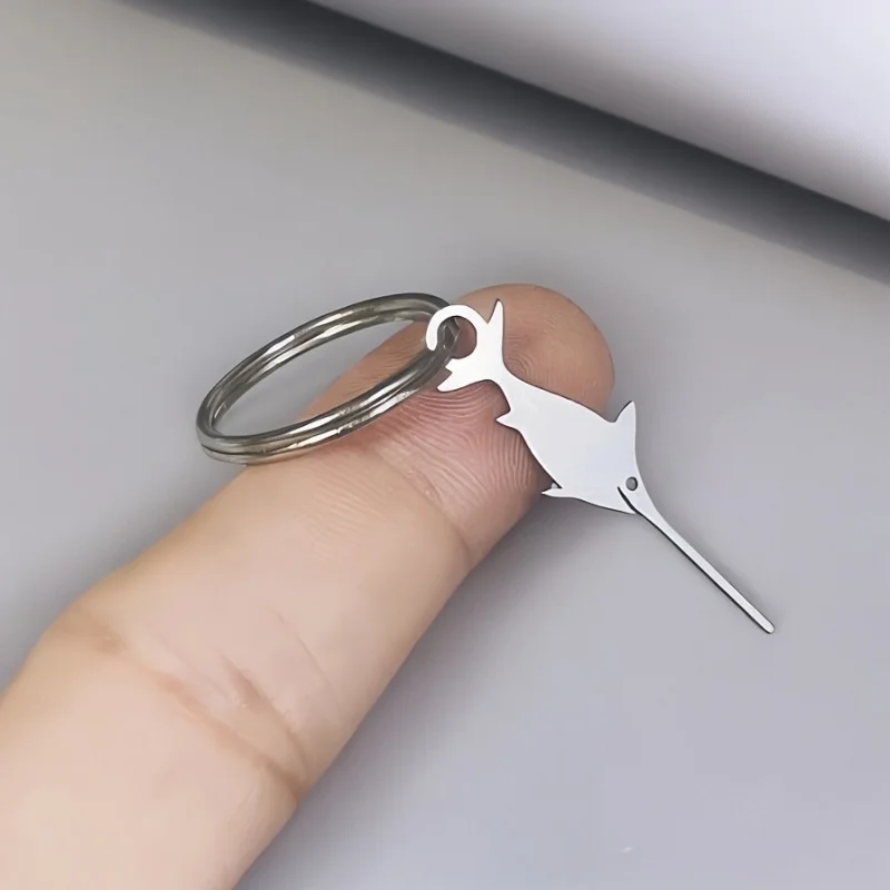 

1 шт. Инструмент для извлечения SIM-карты из нержавеющей стали 304 в форме рыбы-мечта, креативный выталкиватель для телефонных карт, креативный брелок, шпилька для SIM-карты, подвеска для рюкзака