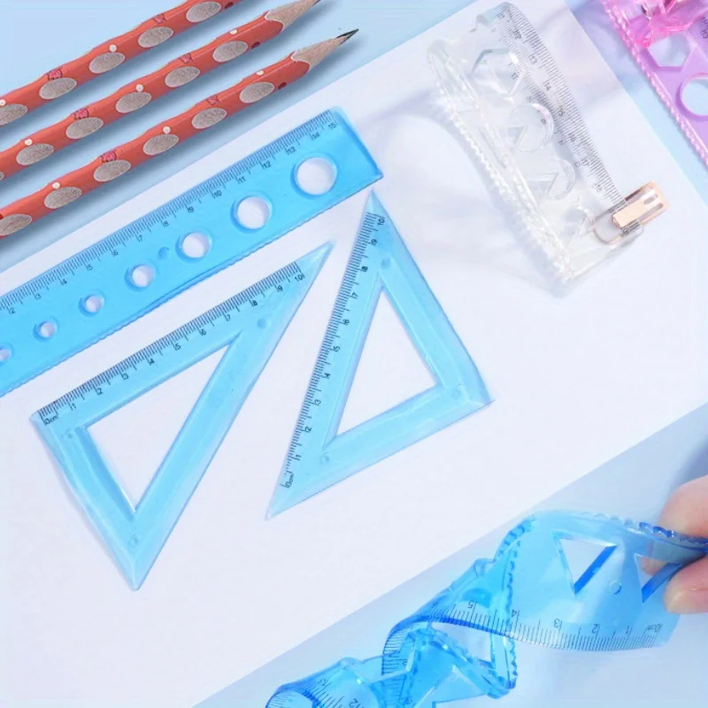 A set of four school supply rulers went out a set of four office supply rulers and a ruler that kept falling off