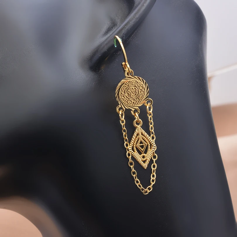 European and American Bohemian style gold coins leaf earrings chain hollow leaf earrings foreign trade women's accessories