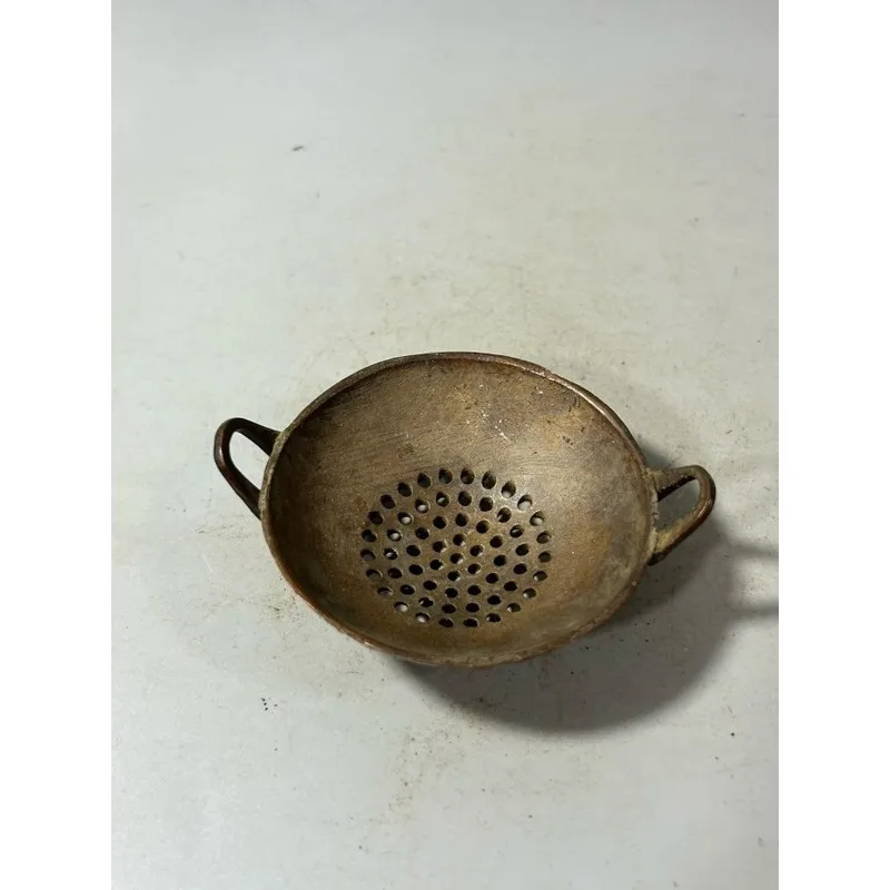 Old antique copper double-handled skimmer, traditional folk item, collectible craft