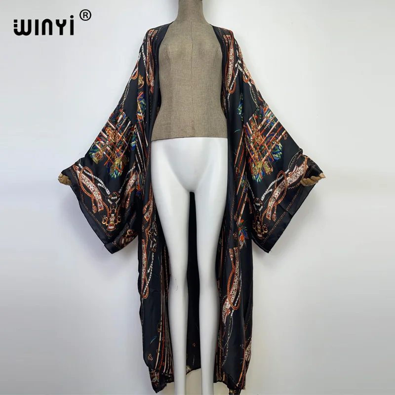 WINYI nowe błyszczące modne drukowanie słodka dama plaża czeski długi kardigan Cover-up stitch Casual Boho Maxi przyjęcie świąteczne kimono