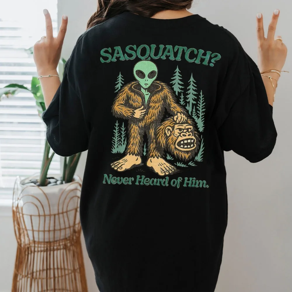 Retro Cryptid T-shirt Funny Sasquatch Tops Never Heard of Him Alien Tee Vintage UFO Clothes Sarcastic Conspiracy Theory Gift