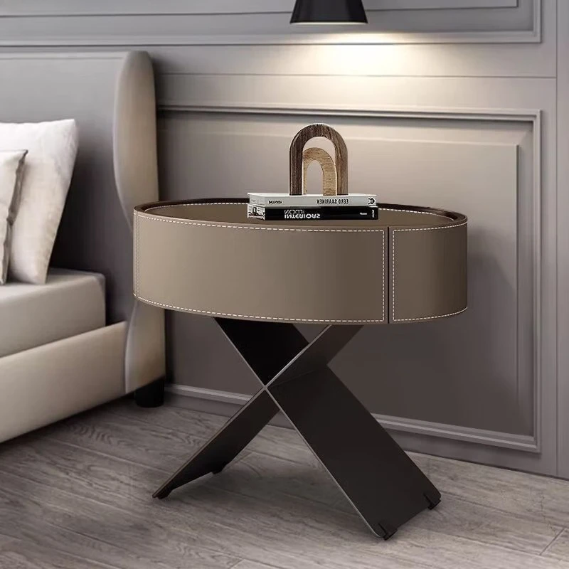 

Solid wood bedside table light luxury modern bedroom simple designer oval saddle leather bedside table