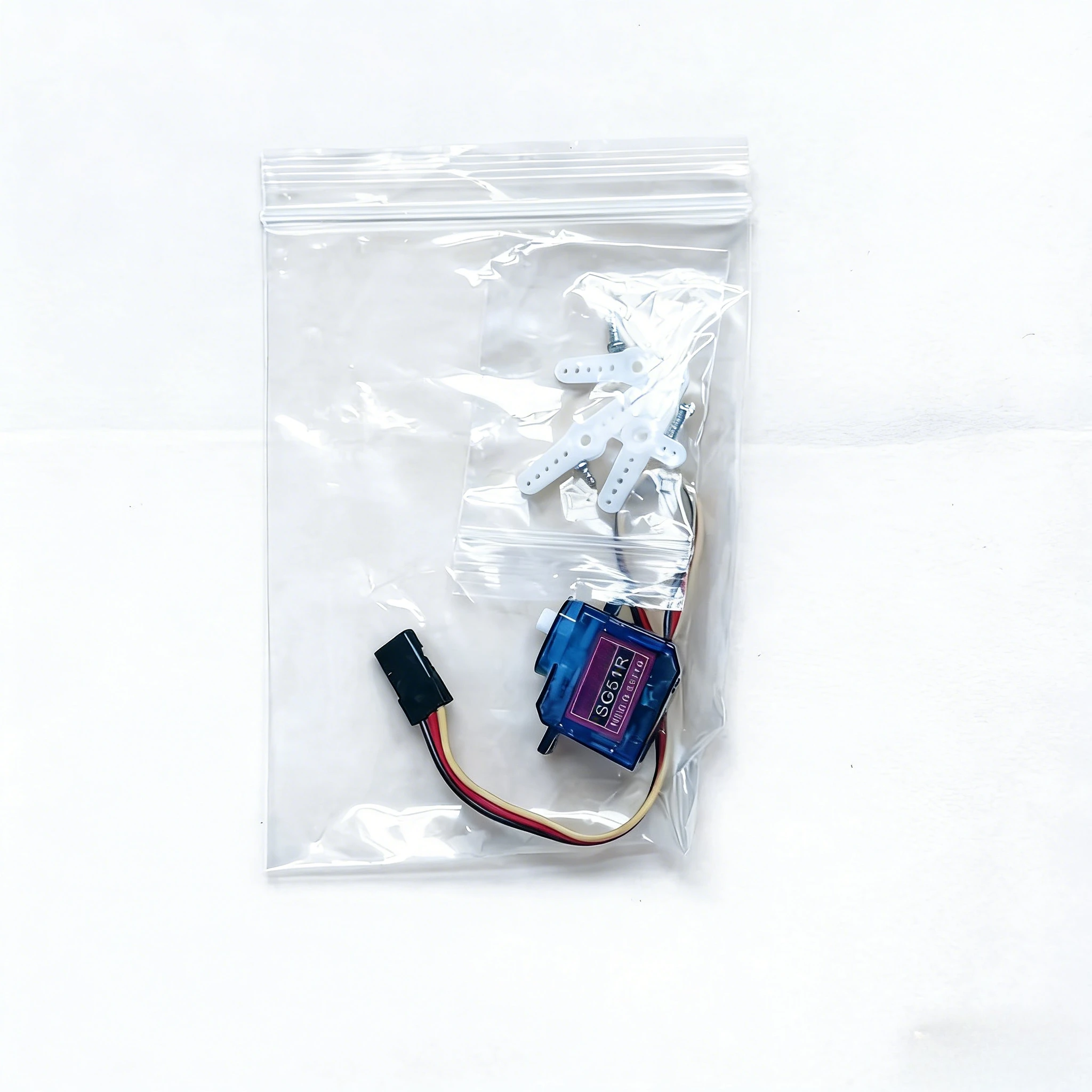 5g Micro Servo SG51R. Compact Size (21.5x11.7mm), 15cm Wire, 3 Mounting Arms for RC Hobby Builds.
