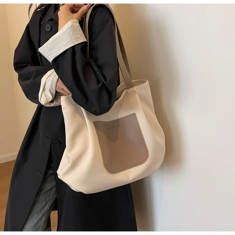 Bolso de lona sólido japonés para mujer, bolso de mano informal, versión coreana, versátil, Retro, de hombro, a la moda, nuevo