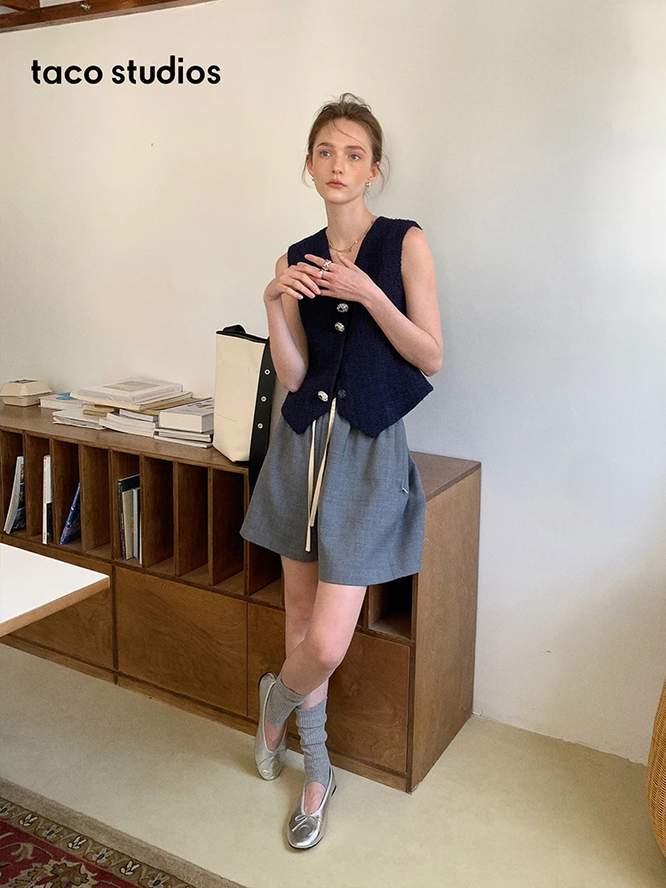 Taco Studios Fashion Design Slim Fit V-Neck Sleeveless Waist-Cinched Vest Top in Dark Blue with Silver Buckle Commute Style P...