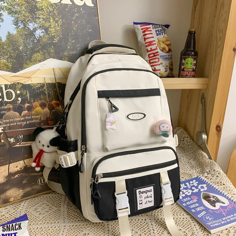 Mochila escolar para estudiantes de escuela primaria, Color de contraste, alivio de carga versátil, nueva