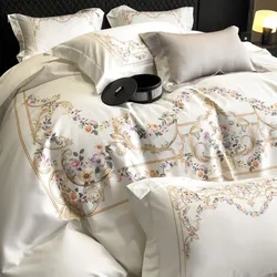 Set di biancheria da letto con ricamo di fiori di cotone egiziano bianco Set di biancheria da letto di lusso 4 pezzi con bordo largo copripiumino in tinta unita federe per lenzuola