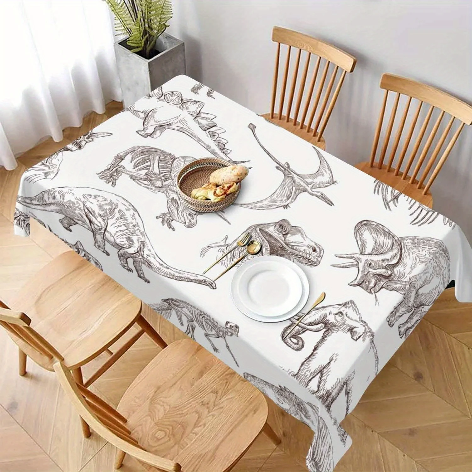 One dinosaur fossil-themed tablecloth, available in multiple sizes to fit tables with 4 to 12 seatsZYC