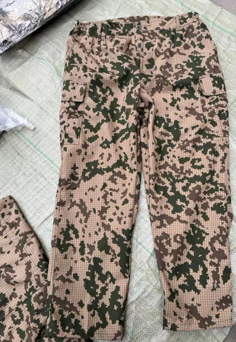 Outdoor camouflage clothing, including jacket and pants