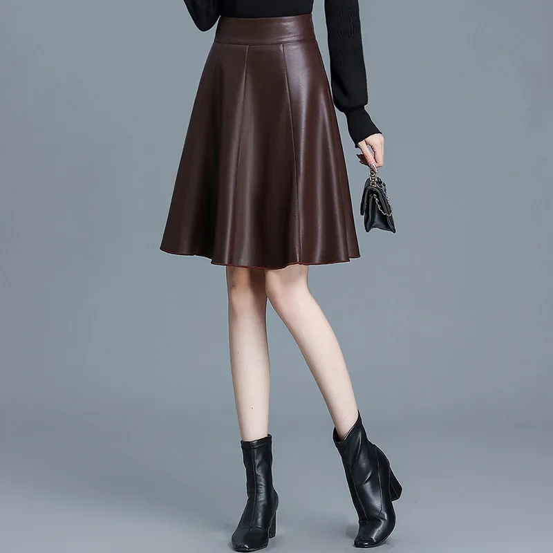 خريف شتاء بولي Leather تنورة جلدية صغيرة ألف خط ميدي تنورة عصرية متعددة الاستخدامات قصيرة عالية الخصر التخسيس مطوي التنانير