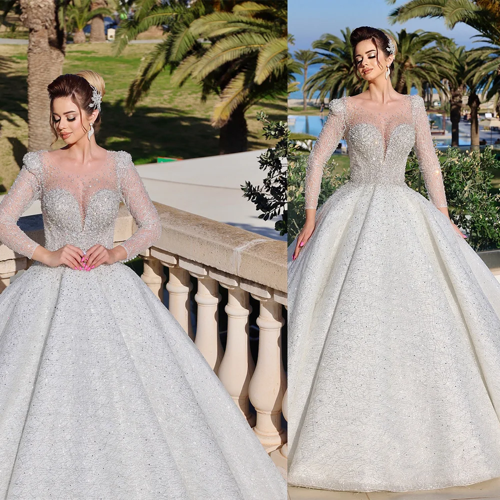 

Gorgeous Ball Gown Wedding Dresses Long Sleeves Sweetheart Applicant Pearls Button Back Chapel Custom Made Vestidos De Novia