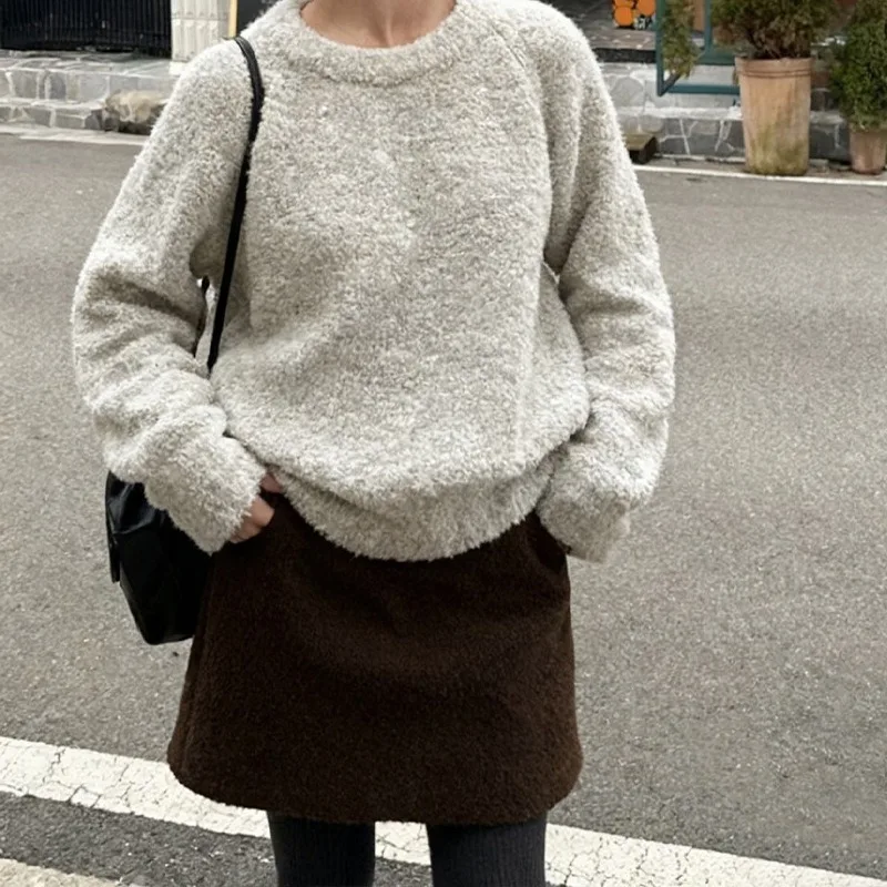 المرأة صوف الضأن تنورة بيضاء مرونة عالية الخصر الحلو عادية الصلبة سميكة أفخم تنورة الخريف الشتاء الكورية ألف خط تنورة قصيرة صغيرة