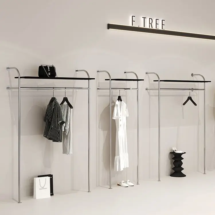 

Women's clothing store, shoes, bags, black shelves, wall display racks, clothing store, stainless steel floor-to-ce