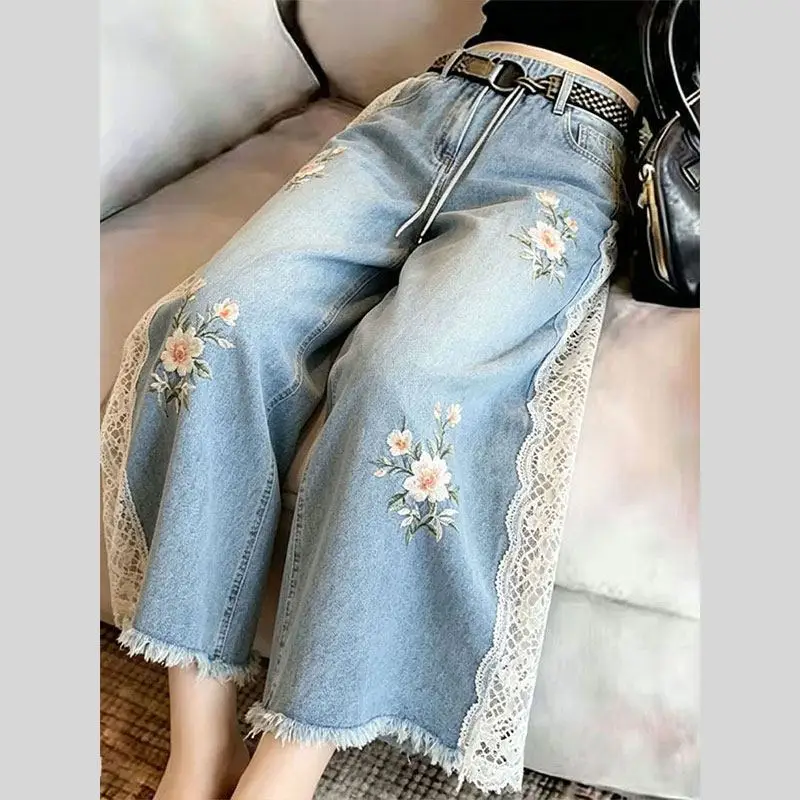 2026 summer women vintage floral pattern lace patchwork ripped tassel wide leg denim pants , woman casual jeans trousers