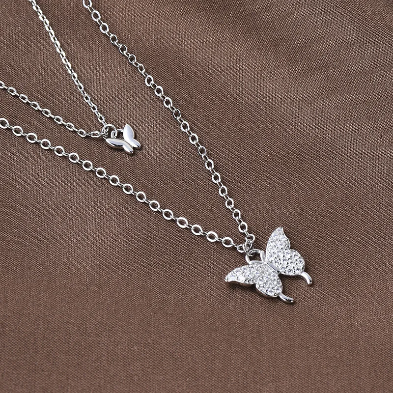 Nuova collana a farfalla da donna a doppio strato in acciaio al titanio, catena con clavicola a farfalla