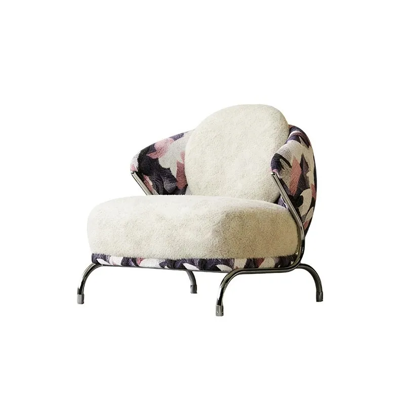Medieval Bauhaus style single sofa, stainless steel single chair on the balcony of the bed and breakfast living room