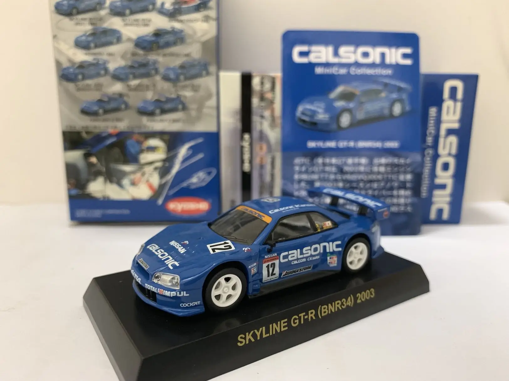 

Kyosho 1:64 Nissan skyline GT-R R34 Calsonic 1999/2003 Collection of die-cast alloy car decoration model toys