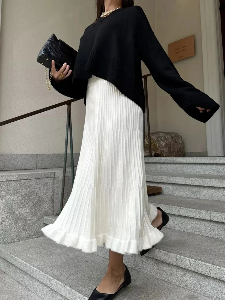 2025 Falda larga de otoño e invierno, falda Midi de punto de cintura alta a la moda blanca, faldas largas elegantes con temperamento acampanado para mujer