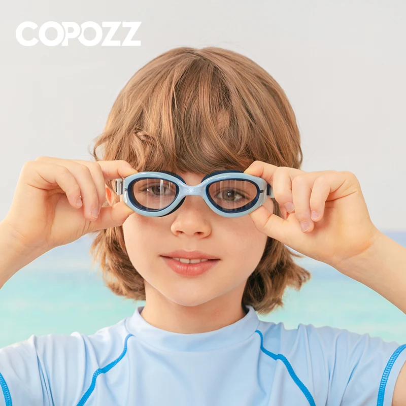 COPOZZ Gafas de natación coloridas para niños, gafas de natación profesionales para niños, gafas de agua con protección UV antiniebla para niño y