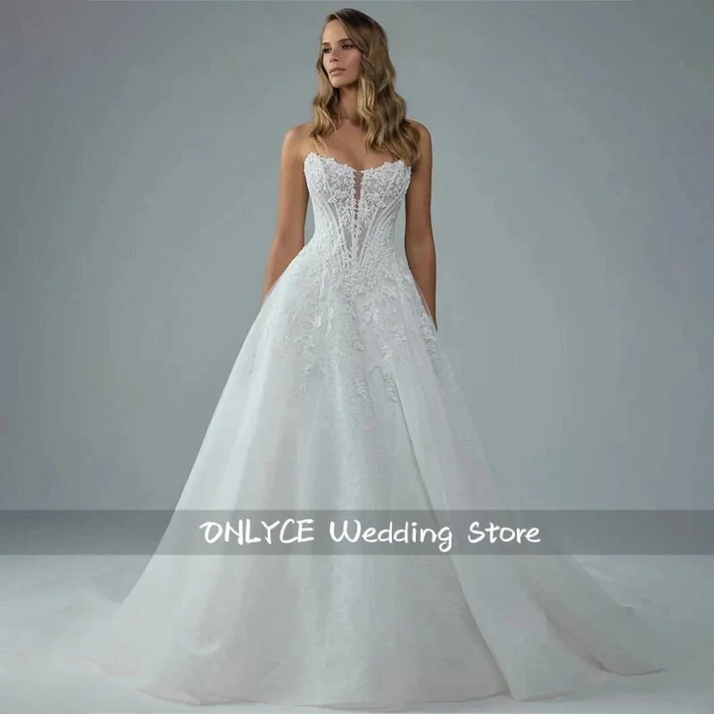 

Custom Made Strapless Sweetheart Corset Wedding Dress Lace Appliques A Line Bridal Gown with Long Train