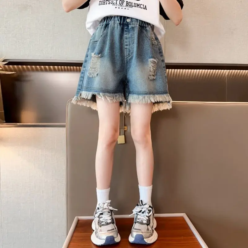 Hot Sale Summer Kids Korean Ripped Denim Shorts with Tassel Teen Girls Elastic Waist Straight Leg Mini Jeans Tween Child Shorts