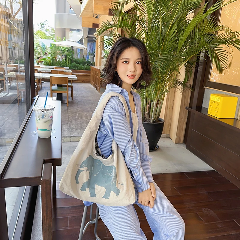 

Двусторонний рюкзак с рисунком ленивого слона, большая вместимость, сумка через плечо, универсальный для поездок на работу, холщовая сумка для покупок.