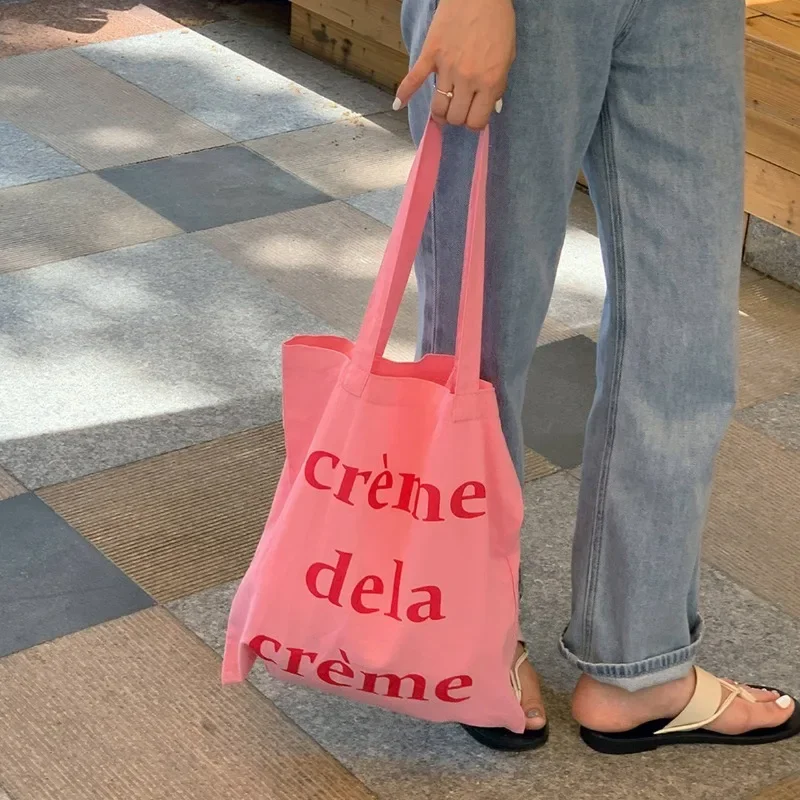 Bolso de playa de Color rosa de gran capacidad, bolso de lápiz labial para maquillaje cosmético, bolso de lona para mujer, bolso de mano con letras Ins