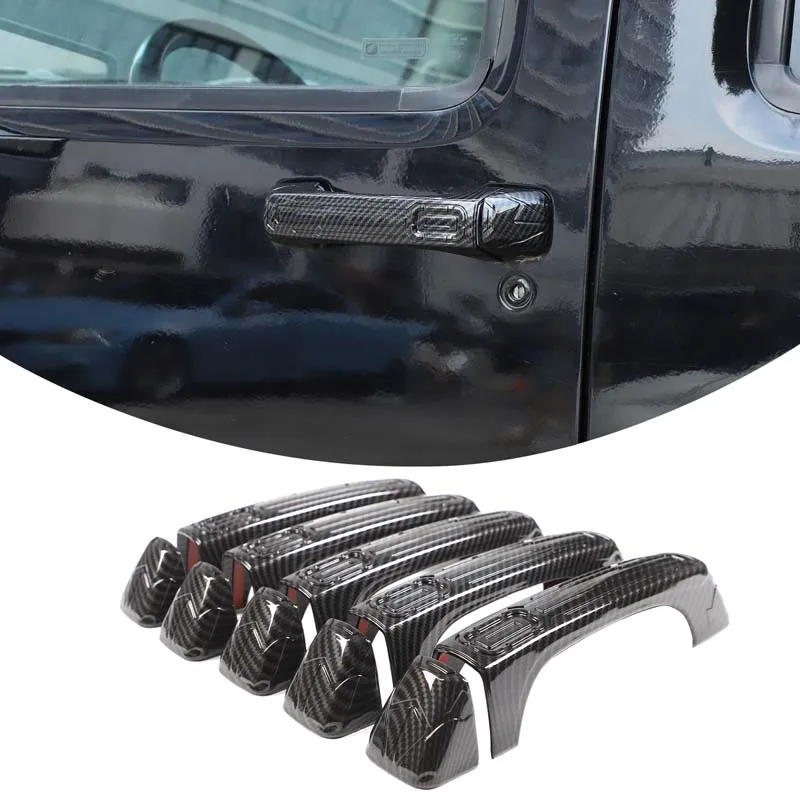 

Для Hummer H3 2005-2009: накладки на внешние ручки дверей и багажника из АБС-пластика под карбон, декоративные наклейки, аксессуары для защиты экстерьера.