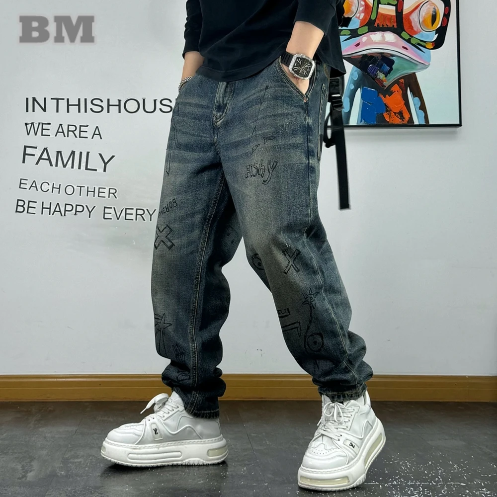 Jeans da uomo con stampa graffiti streetwear giapponese per uomo Harajuku di alta qualità abbigliamento casual da uomo pantaloni cargo in denim moda