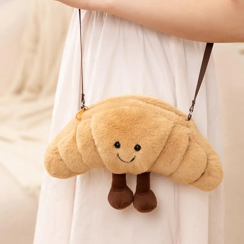 mochila-de-pelucia-pequena-com-tema-de-pao-cartoon-baguete-com-chifres-rosto-sorridente-tamanho-universal