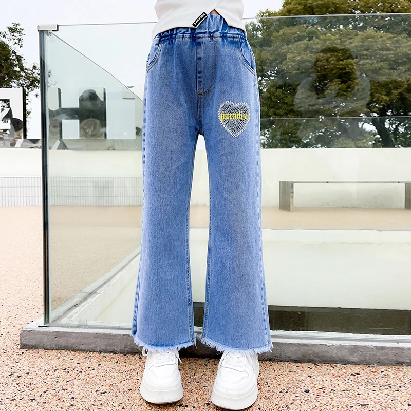 

2023 New Korean girls autumn yellow letters love denim wide-leg pants show height jeans cotton soft patch pants with holes.