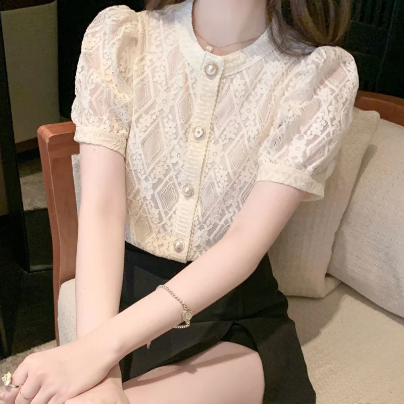 

Elegant Lace O-Neck Solid Color Hollow Out Button Oversized Shirt Summer New Chic Tops Loose Commute Fashion Woman Blouses 2022