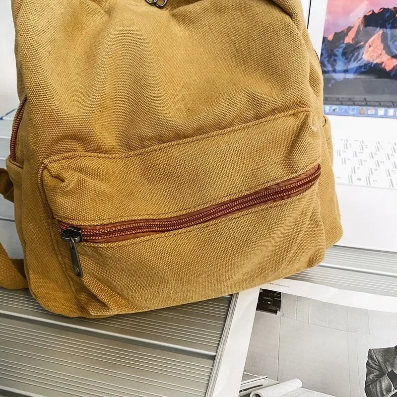 Kleiner Leinwand Vintage Rucksack 2022 neue einfache Unisex Frauen Männer Taschen für Teenager-Mädchen junge einfarbige Damen Mini Rucksack