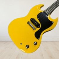 SG Yellow Version Electric Guitars Mahogany Body Black Pickguards with Peach-blossom Xylophone Neck Free Shipping