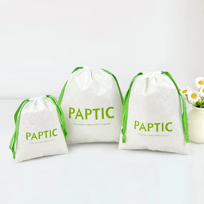 

Подарочные пакеты из бумаги Tyvek с завязками, с возможностью нанесения логотипа, экологичные, водонепроницаемые, для покупок, пылезащитные мешки для упаковки.